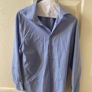 Men’s button down long sleeve. Size is medium & color is blue w/ white squares.